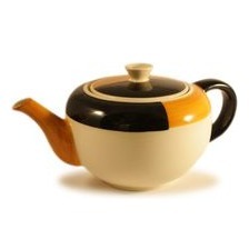 Ritz Teekanne kpl. 499 - zwei versetzte Halbkreise orange u. schwarz