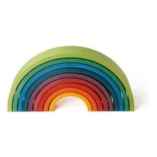 Das Rainbow Spiel von Naef besteht aus neun variablen Bogenelementen aus Holz. Spiel-, Klang- und Kunstobjekt zugleich.   RAINBOW - Designobjekt und Spiel